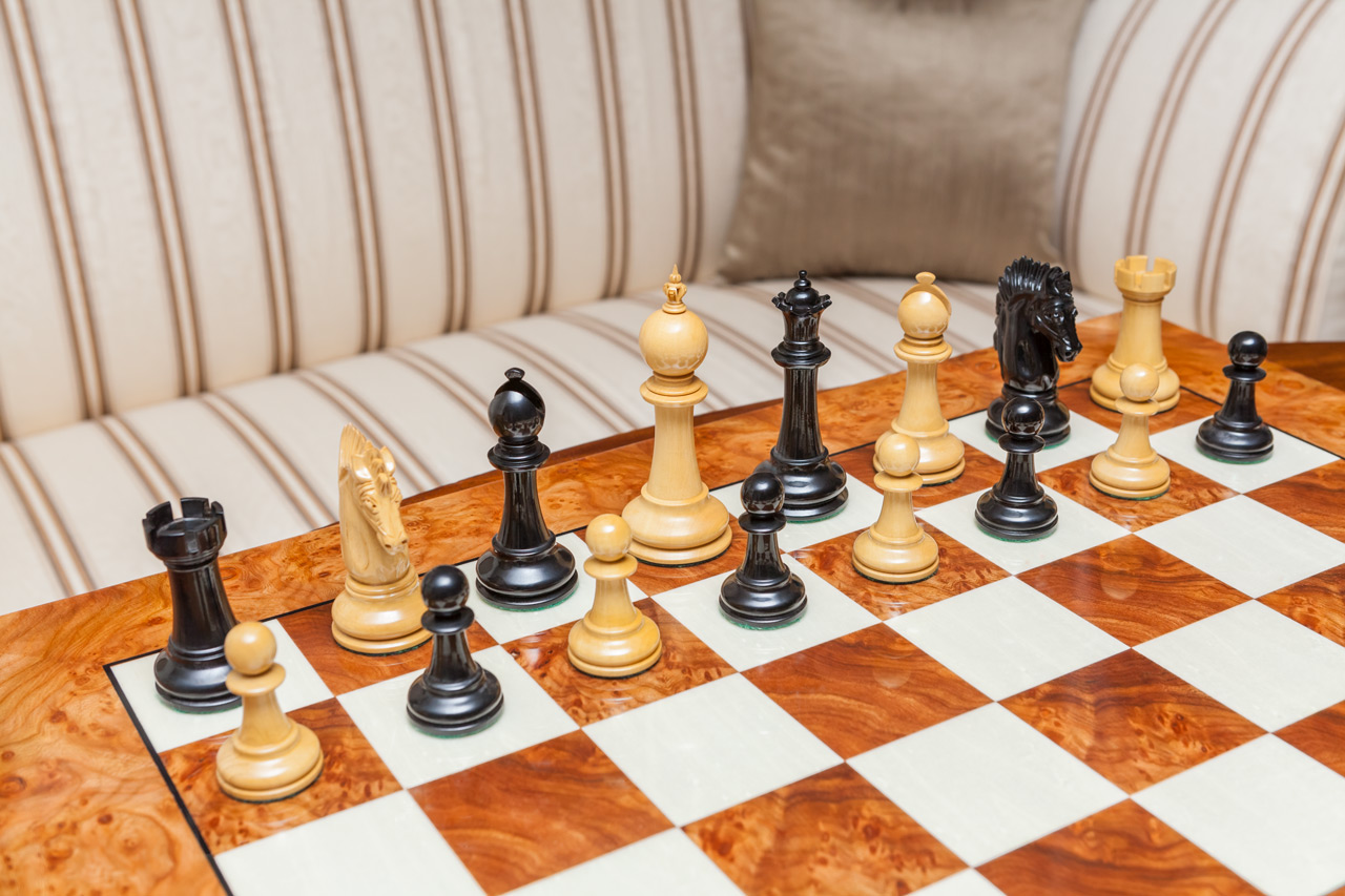 Duke ebony and boxwood pieces in a game position on the Da Vinci board