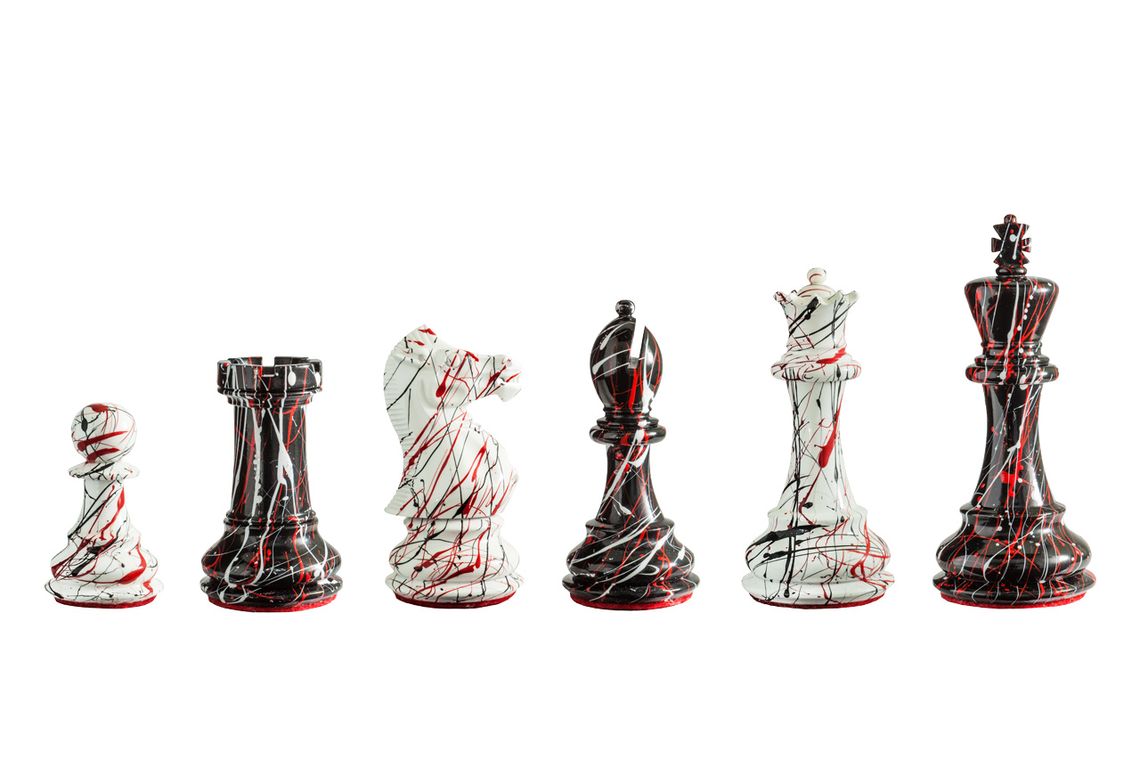 New York black-and-white chess pieces with red veining in a six-piece line-up