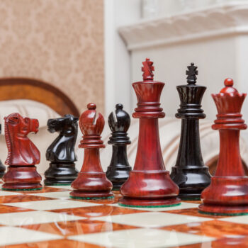 Shown with: 51 cm Venezia chess board Viking lacquered padauk and ebony chess pieces during play on the 51 cm Venezia chess board