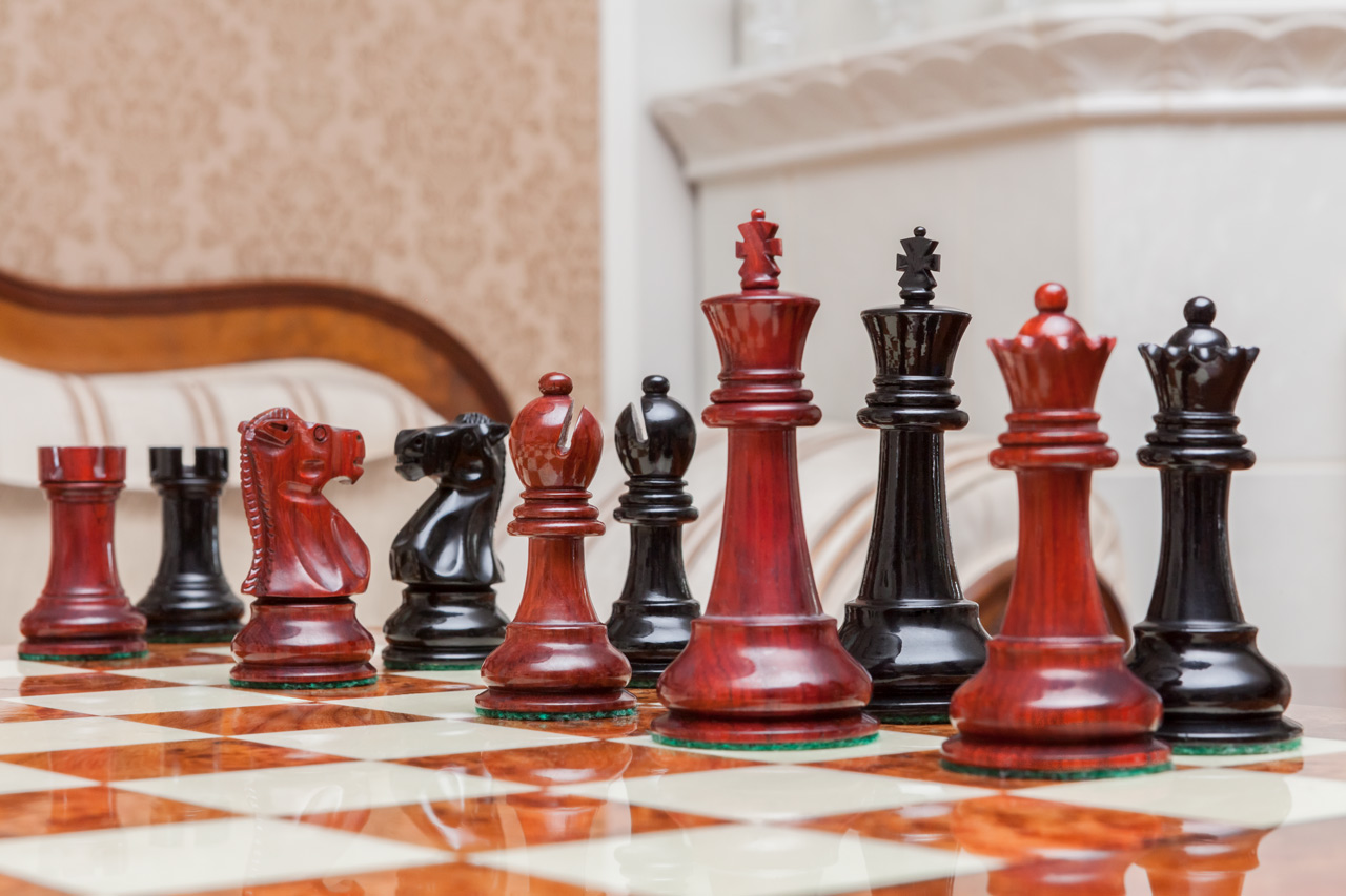 Shown with: 51 cm Venezia chess board Viking lacquered padauk and ebony chess pieces during play on the 51 cm Venezia chess board